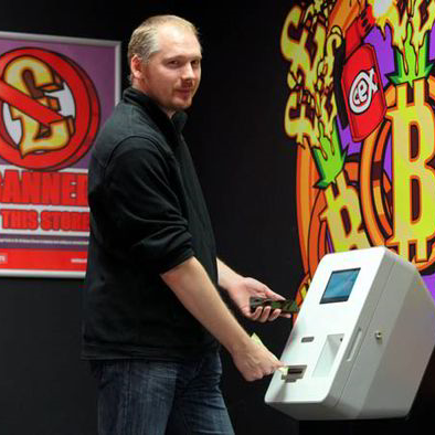 Photo of Andy Wood using a bitcoin machine at CeX